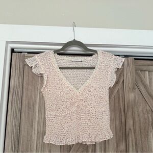 Boutique smocked blouse with lace trim